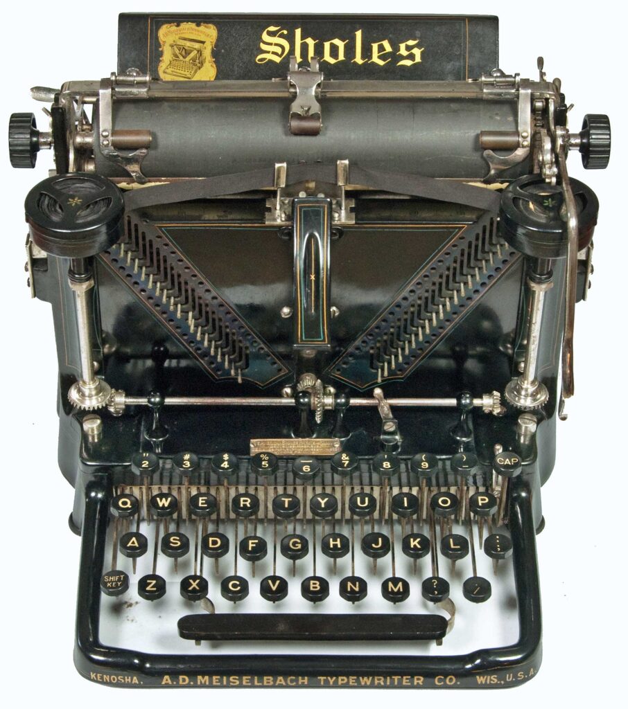 Front view of the Sholes Visible typewriter.